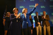 Senators Amy Klobuchar and Tina Smith acknowledged their supporters Tuesday night after Smith's acceptance speech.