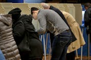 Voters cast ballots Tuesday, Nov. 6, 2018, at Emerson Spanish Immersion School in Minneapolis, MN.] DAVID JOLES ï david.joles@startribune.com Mid ter