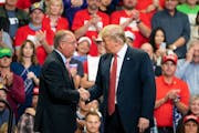 President Donald Trump greeted now-U.S. Rep.-elect Jim Hagedorn on the stage of Trump's rally in Rochester in October.