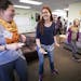 Haley Olson, left, Hannah Kane and Emma Swift played Just Dance on the Nintendo Wii at Stillwater’s Valley Friendship Club. The eight-year-old gathe
