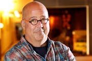 Andrew Zimmern has been paid more than $57,000 to promote Minnesota as a tourism destination in the past year, according to a review of state records.