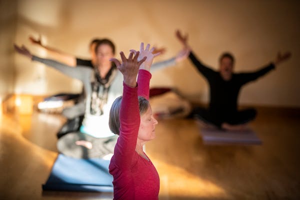 Nancy Boler leads the Mindful Yoga class.
