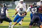 Minneapolis North senior Kehyan Porter went up the middle for a 3-yard touchdown burst in a recent game against Breck. The Polars are one of those tea