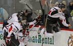 Kyle Rau of Eden Prairie took a victory leap after scoring in the third overtime to end the longest boys' title game in state championship history. Th
