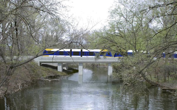A rendering of the Southwest Light Rail train passing through the Kenilworth Lagoon.