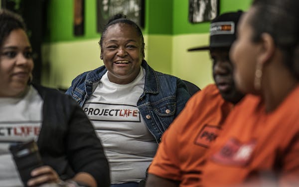 Sa’Lesha Beeks, whose mother was killed by a stray bullet in north Minneapolis, listened to ideas during an advisory board meeting for Project LIFE.