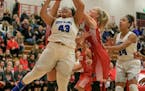 Hopkins' Dlayla Chakolis was fouled by Lakeville North's Geneva Mattis on the way to the basket in the first half. Chakolis scored 22 points in the Ro