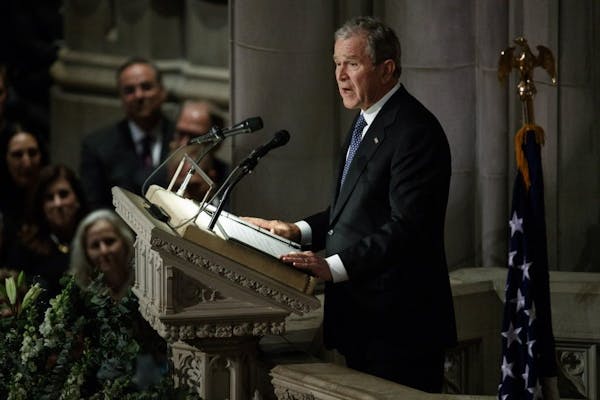 George W. Bush bids emotional farewell to his father