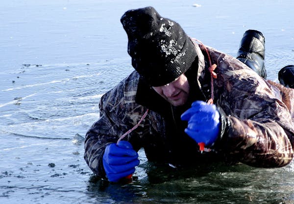 A Cass County sheriff’s deputy used ice picks to pull himself out of a hole in the ice during a training exercise for first responders and law enfor
