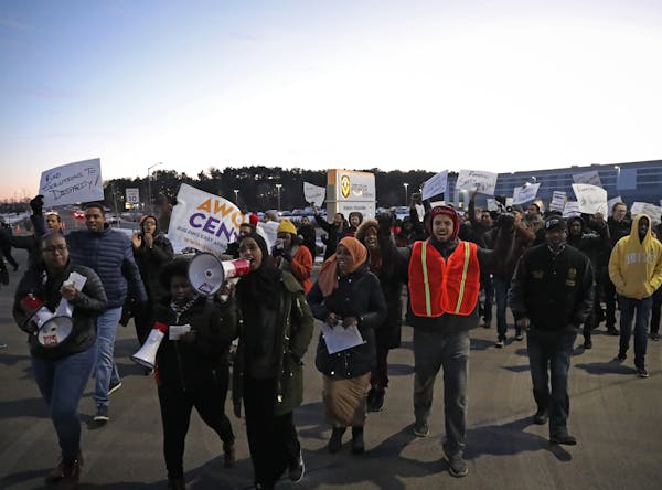 Somali leaders and other community members gathered outside the Amazon fulfillment center in Shakopee to protest working conditions on Friday.