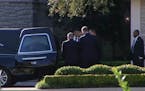 Hearse carrying George HW Bush departs funeral home