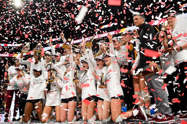 Stanford celebrated after defeating Nebraska in five sets to win the NCAA volleyball championship on Saturday at Target Center.