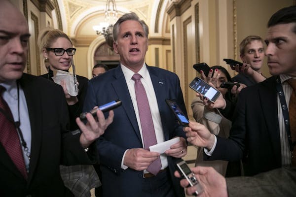 House Majority Leader Kevin McCarthy, R-Calif., left the chamber after the House approved funding for President Donald Trump's border wall Thursday ni