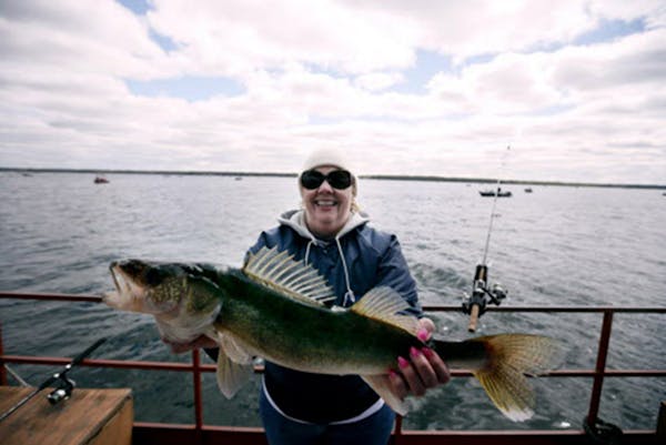 Winnie Zahradka posed with her 25 inch walleye that she caught during the 2015 Minnesota fishing opener at Lake Mille Lacs