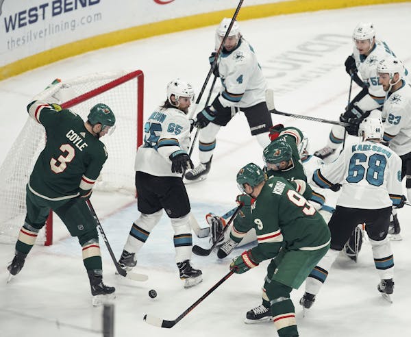 Failed whacks at the puck by (from left) Charlie Coyle, Mikko Koivu and Zach Parise summed up the Wild’s frustration Tuesday.