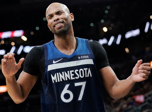 Wolves forward Taj Gibson reacted with frustation after being called for a foul during the second half at San Antonio.