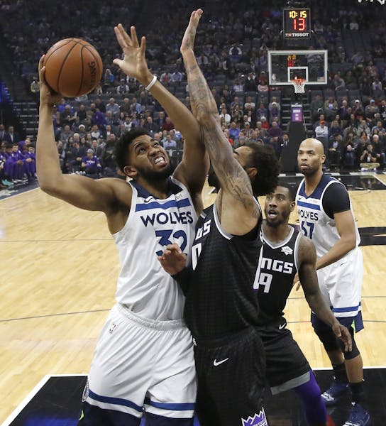 Wolves center Karl-Anthony Towns took a shot Wednesday against the Kings. Minnesota is 0-10 on the road vs. Western Conference teams this season. )