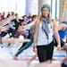 Michelle Henkel, owner and teacher at the Whispering Cave in Wayzata, was accompanied by Minnesota Orchestra harpist Kathy Kienzle at a yoga class las