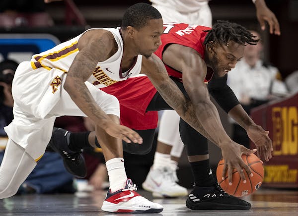 Dupree McBrayer fought for a loose ball in the first half last week against Nebraska.