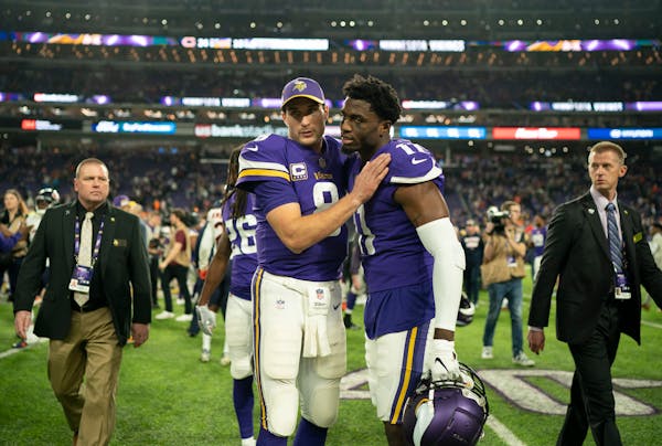 Vikings quarterback Kirk Cousins hugged receiver Laquon Treadwell