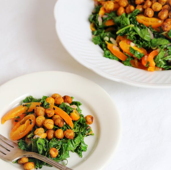 Warm Wilted Kale in Lemony Sesame Dressing With Crispy Chickpeas.