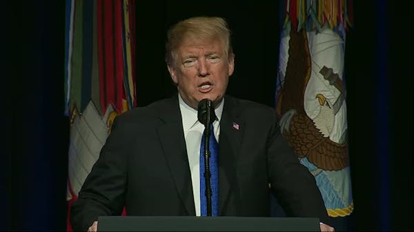 Launching new missile strategy, Trump pushes wall