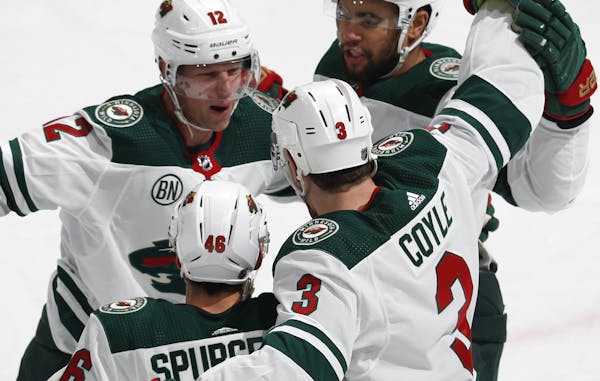 Wild center Eric Staal (12) celebrated the first of his two goals against the Avalanche with left winger Jordan Greenway (back right), center Charlie 