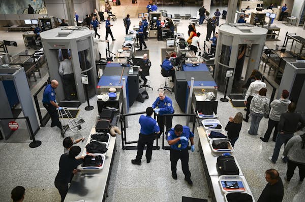 TSA employees worked without pay Tuesday at Terminal 1 at Minneapolis-St. Paul International Airport.