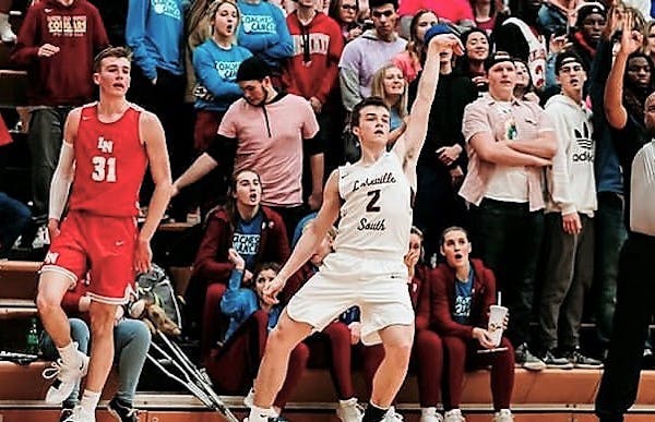 Lakeville South guard Reid Patterson followed through on a successful three-pointer in a victory over Lakeville North on Friday.