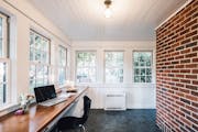 The new office/sunroom has plenty of light, a built-in desk and storage, in-floor heating and energy-efficient windows.