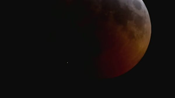 Telescopes capture moon impact during eclipse