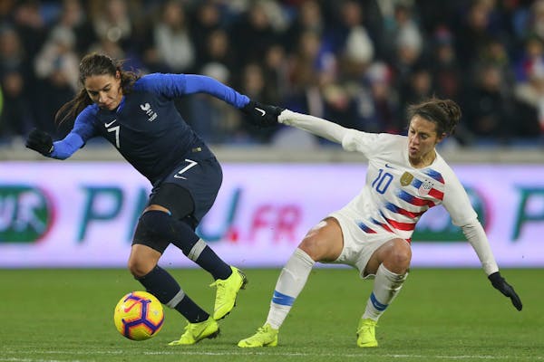 France defender Amel Majri, left, vies for the ball with U.S. forward Carli Lloyd during an international friendly, a 3-1 French victory, on Jan. 19 a
