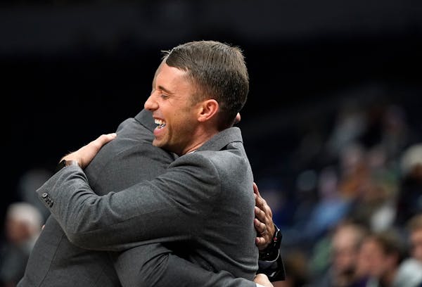 Wolves interim head coach Ryan Saunders embraced Grizzlies coach and fellow Gophers product J.B. Bickerstaff on Wednesday night. BACKGROUND INFORMATIO