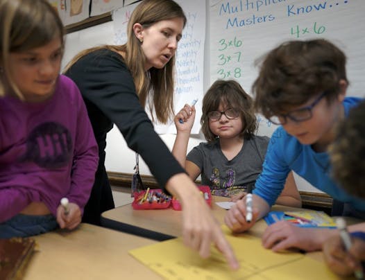 Fourth-grade teacher Lisa Petras worked with Sophia at Howe School in Minneapolis. The federal government pays for about 8 percent of Minnesota's $2.2 billion special education expenses, a gap that is pushing districts to make big cuts elsewhere.