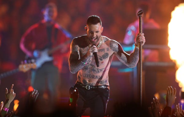 Maroon 5's Adam Levine goes shirtless during the Super Bowl LIII Halftime Show on Sunday, Feb. 3, 2019, at Mercedes-Benz Stadium in Atlanta. (Curtis C