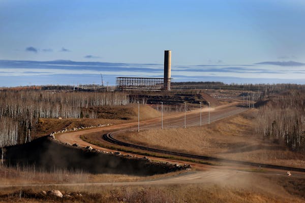 The stacks and the steel frame for the induration building are seen on the site of Essar Steel Minnesota's taconite mine project in Nashwauk, Minn.