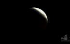 Total lunar eclipse comes with supermoon bonus