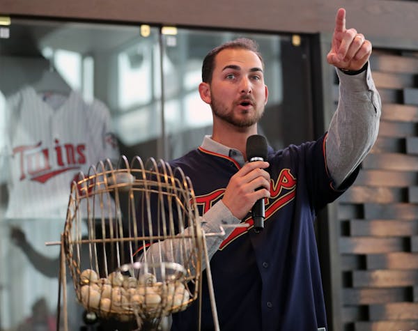 Chase De Jong called out numbers for bingo games at TwinsFest last week.