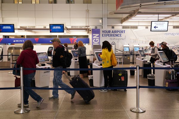 Passengers printed tickets from the kiosks at the Delta Air Lines counter at Minneapolis-St. Paul Airport in October.