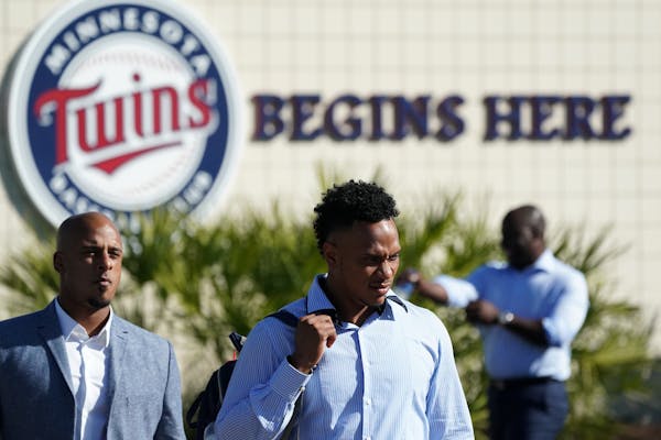 Twins shortstop Jorge Polanco arrived for Friday's news conference to announce contract extensions for he and outfielder Max Kepler.