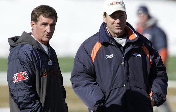 Mike Shanahan, left, was head coach and Gary Kubiak the offensive coordinator when the Broncos won two Super Bowls.