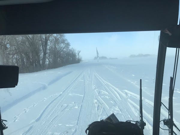 The St. Cloud State team bus got stuck in a drift in Watonwan County on Sunday.