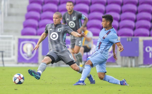 Minnesota United FC’s Ozzie Alonso (6) fights for a loose ball during the first half of an MLS soccer friendly match against New York City FC on Feb