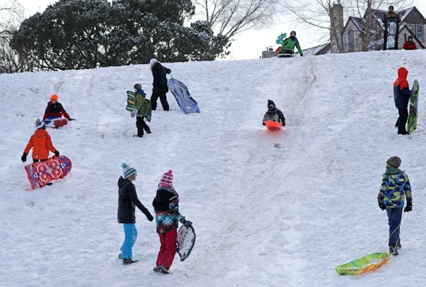 A snow day in February brought out a crowd of kids in Minneapolis to play.