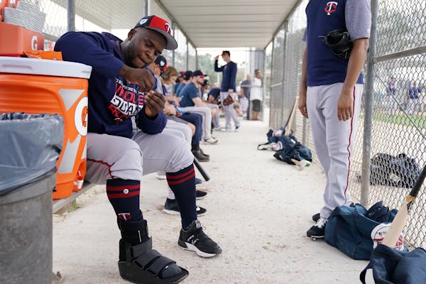 Miguel Sano has worn a boot on his right foot since the Twins started full squad workouts in spring training.