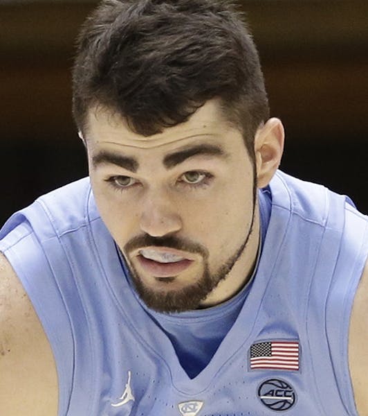 North Carolina's Luke Maye (32) dribbles against Duke during the first half of an NCAA college basketball game in Durham, N.C., Wednesday, Feb. 20, 20