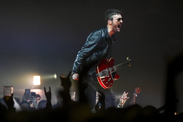 Wearing his signature shades, Eric Church performed Friday night at Target Center in Minneapolis.