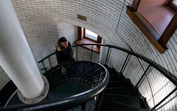 Lee Radzak climbed the spiral steps leading to the top of Split Rock Lighthouse near Two Harbors, Minn. After 36 years as the site’s manager, he is 