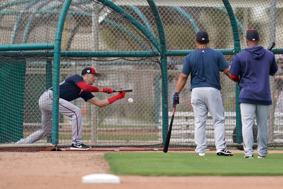 Justin Morneau and Rod Carew stop by Twins spring training