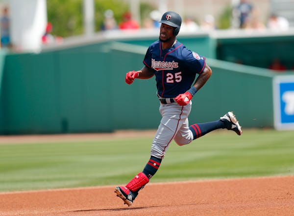 Twins center fielder Byron Buxton rounds the bases after hitting a solo-home run in the third inning of a spring training game against the Red Sox on 